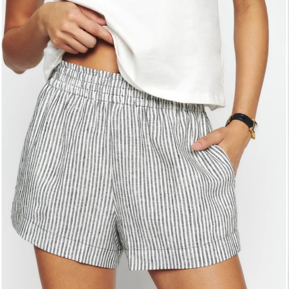 Reformation linen shorts in "vineyard"
